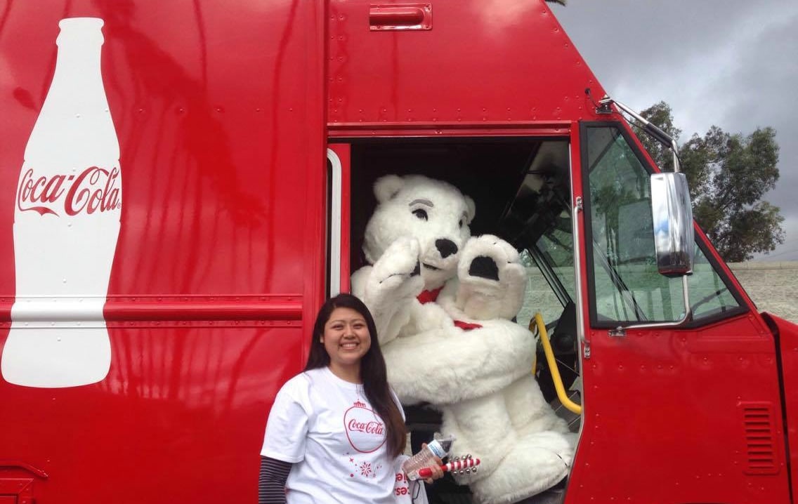 This year, Coca-Cola became the official sponsor for the East Los Angeles Christmas parade. As a 2012 Coca-Cola Scholar who was born and raised in East LA, Rocio Ortega reached out to Nancy Limon from The Coca-Cola Company in LA to see how she could help. She ended up marching in the East LA parade with her sister in tow alongside of the big Coca-Cola red truck and the polar bear! Recently, the East LA Christmas Parade had been cancelled due to funding but thanks to the support of Coca-Cola, the new official sponsors moving forward, the parade is back in town! This year's parade took place on Sunday, November 27, and Rocio was proud to have the chance to walk in it representing her favorite brand, Coca-Cola.