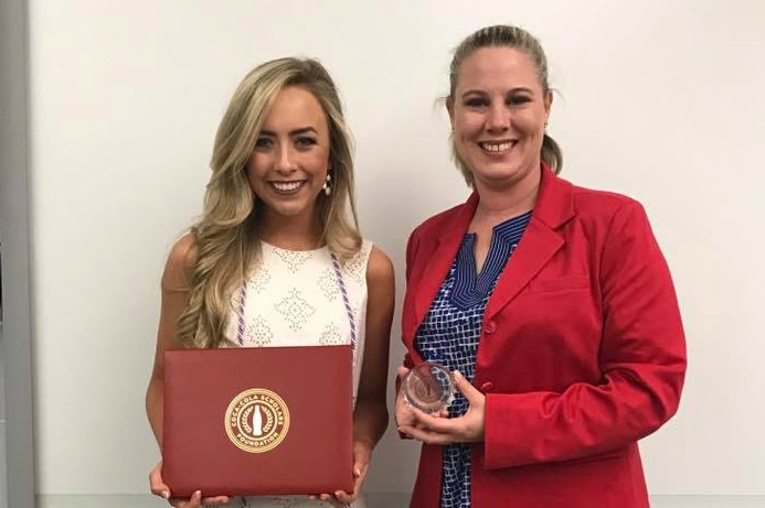 Katie Gardner (2017) and Educator of Distinction Lesley Allen from Fayetteville High School in Arkansas.