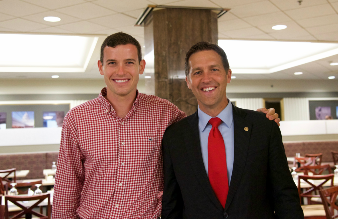 Grant Means (2012) and Senator Ben Sasse (1990) grabbed a picture together.