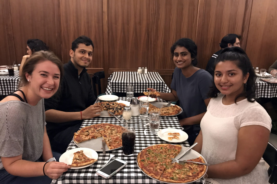 Scholars connected over pizza and Cokes at Case Western Reserve University.