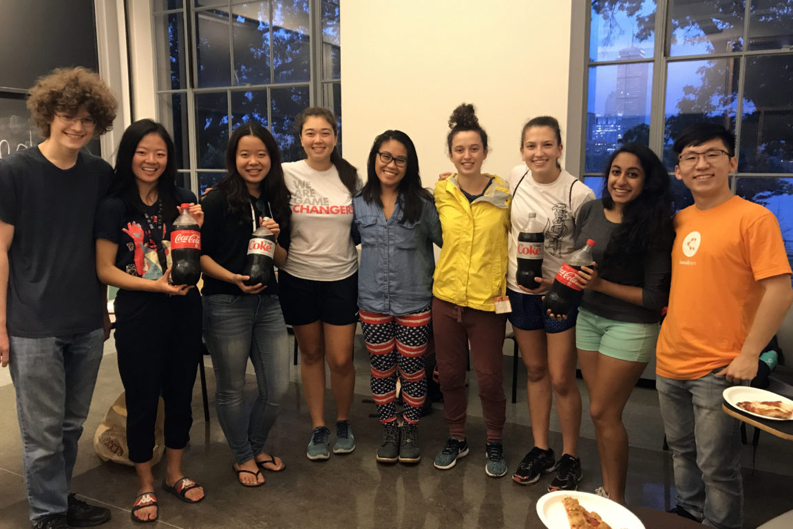 MIT Scholars met up for pizza and enjoyed their Cokes and Diet Cokes.