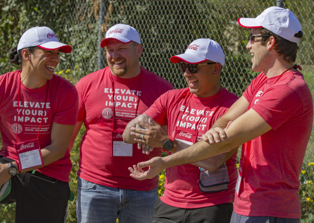 Che and fellow Scholar alumni at the 2017 Service Summit in Denver cleaning up a neighborhood park. The Service Summit was a 3-day event for alumni to connect and make an impact through service.