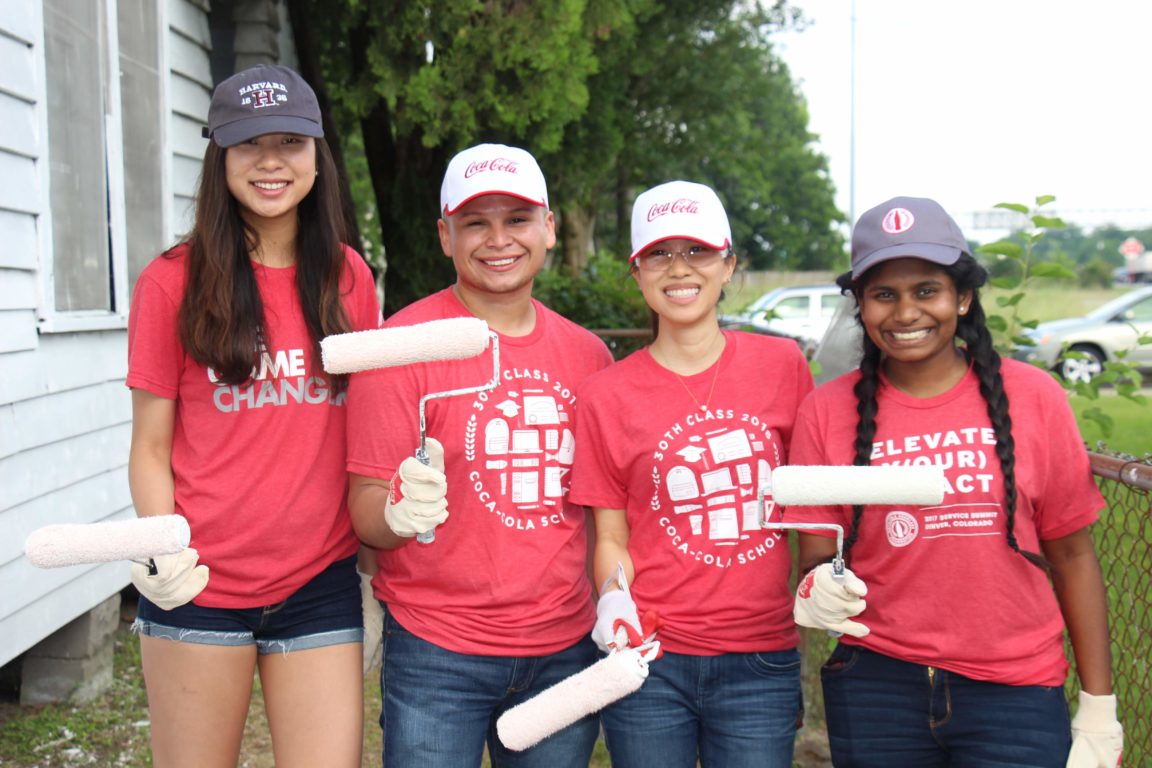 Coke Scholars Karen Yang (2016 Scholar), Jose Garcia (2011), Jennifer Nguyen (2009), and Shree Balaji (2018) paint a Houston home during the service day.