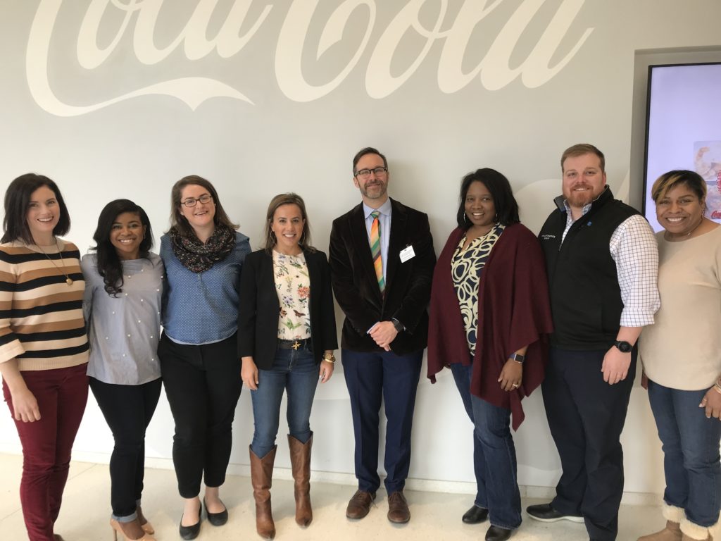 Bria Savage (2012, second from left) and Jim Heath (1992, middle right) visited CCSF staff at Coca-Cola Headquarters in Atlanta for lunch.