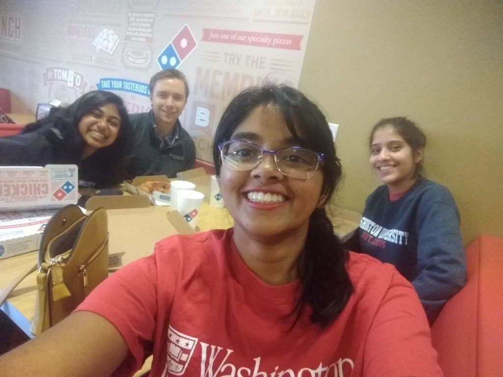 Scholars at Washington University St. Louis also enjoyed pizza and Coke at a Slices for Scholars event, which included Jessika Baral (2017), Jack Terschluse (2012), Meenu Bhooshanan (2018), and Anamika Basu (2018).